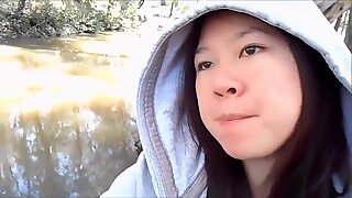 My cute asian girlfriend sucking me off in a public park and swallowing